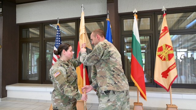 Capt. Gabriela Montanez accepted command from Acting Garrison Commander Lt. Col. Jeremy McHugh in Kaiserslautern, Germany.