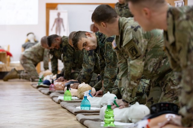 U.S. Army Soldiers assigned to Civil Affairs Team 0733, 407th Civil Affairs Battalion and Bulgarian Land Forces soldiers assigned to the Civil-Military Cooperation Company, 78th Support Battalion conduct CPR simulation onto medical-specific manikins during a combined Bulgarian Red Cross training at Lozen, Bulgaria, May 10, 2022. The coordination between U.S. Army Civil Affairs, Bulgarian Civil-Military Cooperation, and local civilian organizations is crucial in supporting humanitarian assistance and disaster relief in the region, and is necessary to protect and promote humanitarian principles. Bulgaria is a steadfast and gracious host, and the U.S. is honored to continue its long-term cooperation through engagements such as bilateral exchanges to improve partnership interoperability. (U.S. Army photo by Capt. Angelo Mejia, 5th Mobile Public Affairs Detachment)