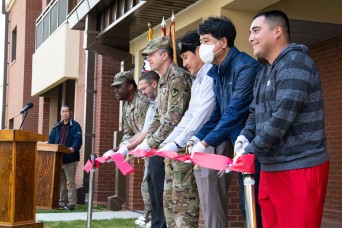 Camp Humphreys, Republic of Korea – A new family housing complex opened here, May 13, following a ribbon-cutting ceremony. The three towers, containing...