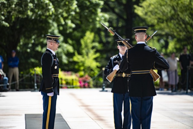 Tomb guards from the 3d U.S. Infantry Regiment (The Old Guard) perform the Changing of the Guard at the Tomb of the Unknown Soldier at Arlington National Cemetery, Arlington, Va., May 10, 2022. 