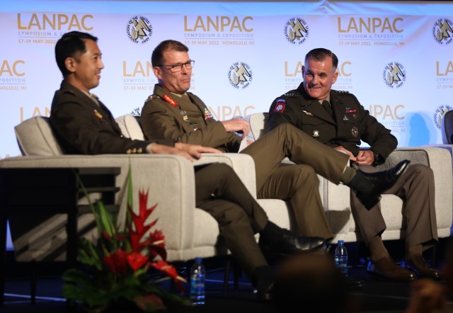 Gen. Charles A. Flynn, right, commander of U.S. Army Pacific; Australian Army Maj. Gen. Chris Smith, deputy commander of USARPAC for strategy and plans; and Brig. Gen. Frederick Choo, chief of staff for the Singapore Army, participate in a panel discussion on the Indo-Pacific strategic environment during the Land Forces Pacific Symposium in Honolulu May 17, 2022. Other panelists included Maj. Gen. James B. Jarrard, chief of staff for USARPAC; Elbridge Colby, former deputy assistant secretary of defense for strategy and force development; and Camille Dawson, deputy assistant secretary for the Department of State’s Bureau of East Asian and Pacific Affairs.