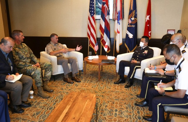Gen. Charles A. Flynn, left center, commander of U.S. Army Pacific, and Maj. Gen. JB Vowell, left, commander of U.S. Army Japan, hold a bilateral engagement with Lt. Gen. Toshikazu Yamane, right center, vice chief of staff for the Japanese Ground Self-Defense Force, in Honolulu May 18, 2022. Senior leaders from the U.S. Army and more than 20 foreign armies held hundreds of bilateral talks during the Land Forces Pacific Symposium, the largest land power conference in the Indo-Pacific region.