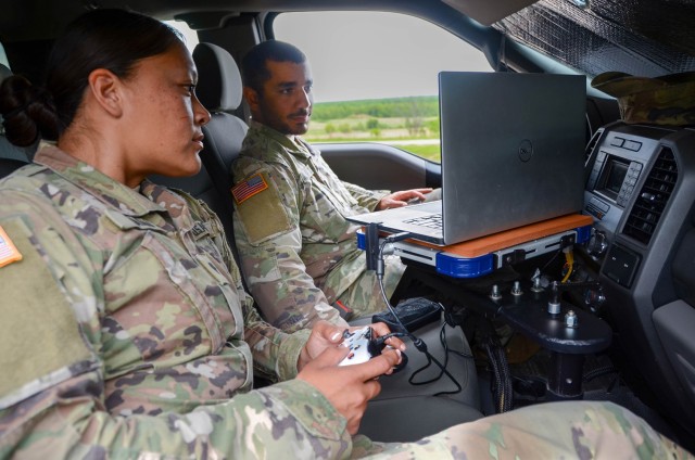 Sgt. Daniel Alexander, with Fort Leonard Wood’s 595th Sapper Company (right), and Spc. Wyanet Nakai, from the 212th Military Police Company at Fort Bliss, Texas, operate what’s being called the Mobile-Acquisition, Cue and Effector, or M-ACE, May 17 at Range 19. The system integrates radar technologies with a remote cue system to lock onto and disable a moving target. Alexander and Nakai assessed the emerging capability as part of the two-week Maneuver Support, Sustainment and Protection Integration Experiments, or MSSPIX, hosted each year by U.S. Army Futures Command and the Maneuver Support Center of Excellence. The event gives Army leaders and capability developers a chance to gain insights into the viability of emerging technologies through non-biased Soldier feedback.