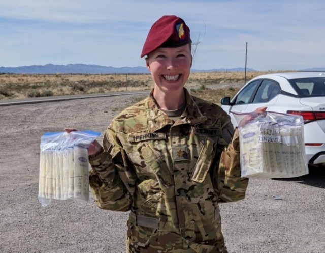 Maj. Cassandra Perkins with the 82nd Airborne Division showcases the breastmilk she pumped and donated to Mountain West Mothers’ Milk Bank throughout her stay at Dugway Proving Ground for the Experimental Demonstration Gateway Event 2022.
