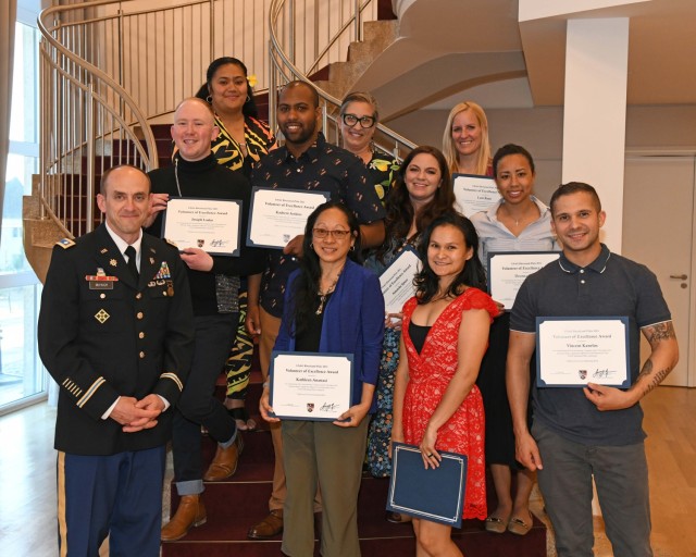 U.S. Army Garrison Rheinland-Pfalz Commander Jeremy McHugh with the category winners at the annual Volunteer of the Year awards ceremony.
