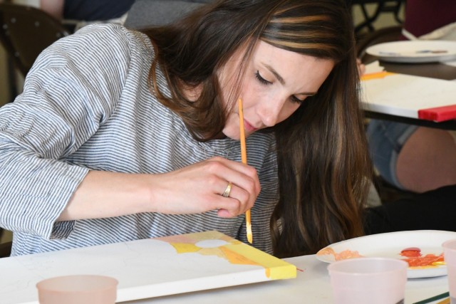 Fort Drum Family Advocacy Program staff helps community members to paint stress away