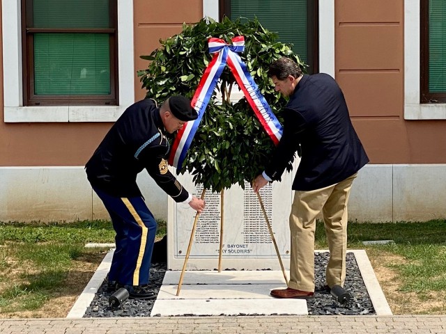 Col. William Ostlund, right, a retired Army officer who commanded the 2nd Battalion, 503rd Parachute Infantry Regiment in Afghanistan and and Sgt. Maj. Sean Horval, place a wreath to the fallen 173rd Airborne Brigade Soldiers from the 2007-2008 tour.
