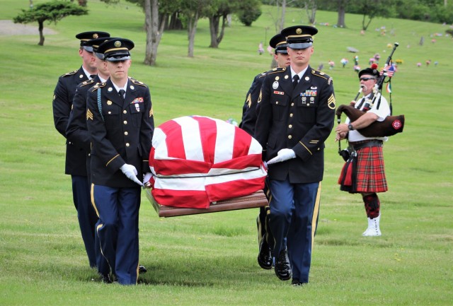 New York Army National Guard Soldiers carry the remains of Korean War MIA Cpl. Robert Charles Agard Jr. during his funeral ceremony honors May 27, 2022, at the Forest Lawn Memorial Park Cemetery in Elmira, N.Y. Agard was returned home after more than 70 years listed as missing in action following his death in North Korea.
