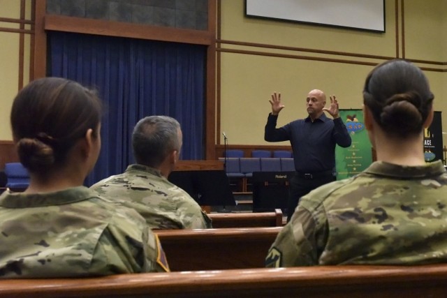David Woods Bartley, a mental health advocate and suicide prevention educator, speaks with Soldiers Tuesday morning at the Main Post Chapel. Bartley spoke with hundreds of Soldiers, family members and civilian employees during a weeklong series of presentations here on suicide and mental illness.