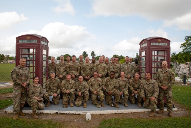 Kentucky National Guard&#39;s Headquarters and Headquarters Detachment (HHD), 75th Troop Command, poses for a group photo at the end of Operation Tradewinds 2022 at Price Barracks, Belize, May 20, 2022. HHD, 75th Troop Command, provided brigade-level support to the multinational exercise. (U.S. Army photo by Staff Sgt. Andrew Dickson).