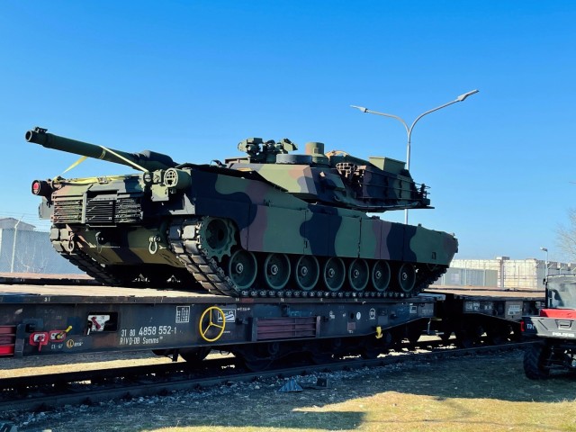 An M1A2 Abrams main battle tank is loaded onto a German rail car on March 10 at Coleman worksite in Mannheim, Germany. The 405th Army Field Support Brigade recently began augmenting its line-haul heavy equipment transporter deliveries of an entire armored brigade combat team’s worth of Army Prepositioned Stocks-2 equipment with rail.