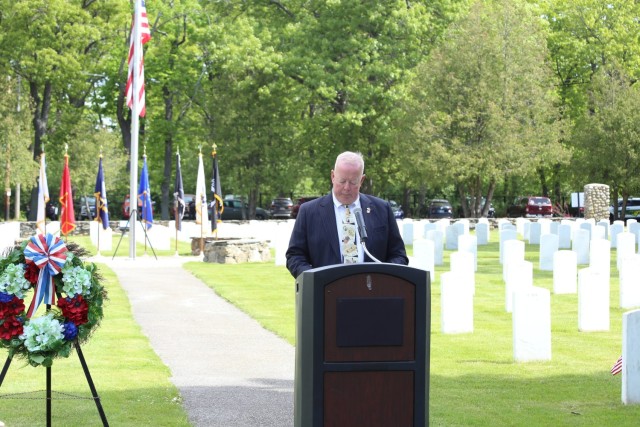Joe Cunningham narrates at Memorial Day ceremony at Fort Devens post cemetery.