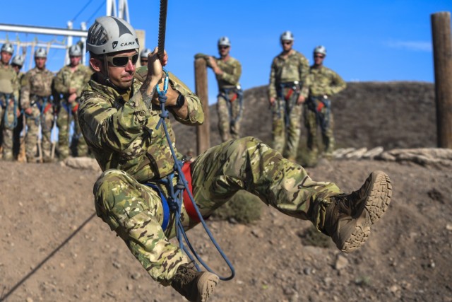 U.S. Air Force Tech. Sgt. Roy Wollgast, an 82nd Expeditionary Rescue Squadron survival, evasion, resistance and escape specialist, completes an obstacle during the French Desert Commando Course at Arta Range, Djibouti, April 26, 2022. Since 2015, the French Forces stationed in Djibouti have invited U.S. service members with the Combined Joint Task Force – Horn of Africa and Camp Lemonnier to participate in the course. (U.S. Air Force photo by Senior Airman Blake Wiles)