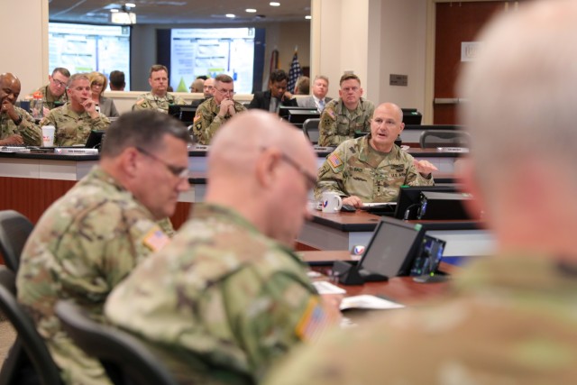 Gen. Ed Daly, right, commanding general of the U.S. Army Materiel Command, speaks during the Organic Industrial Base Commander&#39;s Summit. Held June 1-3, 2022 at Redstone Arsenal, Ala., this meeting of AMC leaders focused on the initiatives and efforts the command is undertaking to modernize the organic industrial base of the U.S. Army.