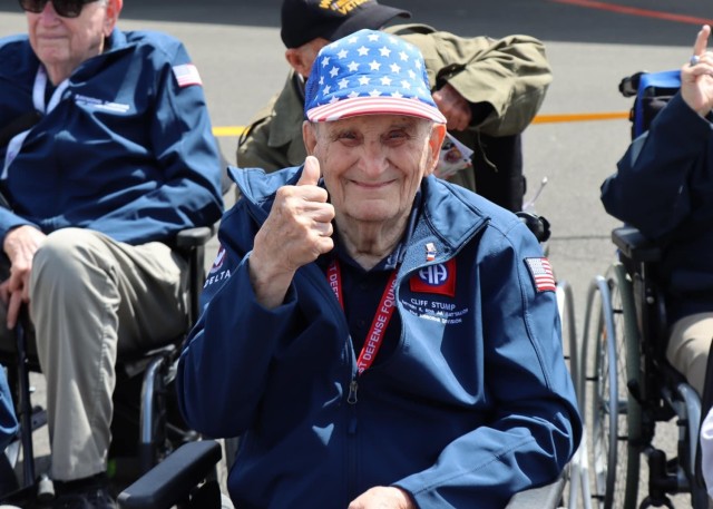 Cliff Stump, a U.S. Army veteran who served with the 82nd Airborne Division, delivers a thumbs up.