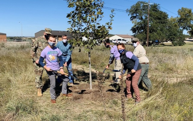 Fort Hood Garrison Commander Col. Jason Wesbrock, along with Directorate of Public Works officials and a representative from the Texas A&M Forest Service, plant a tree in the Pollinator Sanctuary footprint, October 30, 2020. The ceremony commemorated the 15th consecutive year the installation has been recognized by the Arbor Day Foundation as a Tree City USA community. In 2021, Fort hood was recognized for a 16th consecutive year and during the award period, 1,629 trees were planted across the installation. 