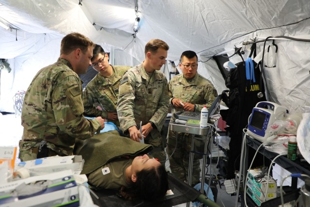 A Soldier receives hands-on training with field hospital equipment