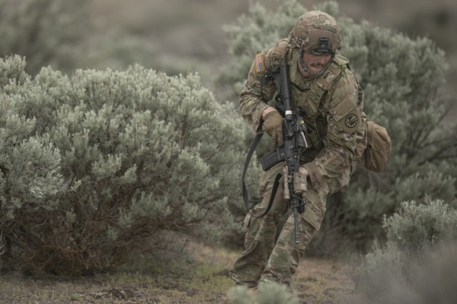 Idaho Army National Guard Soldiers from Charlie Company, one of three companies making up the 2-116th Combined Arms Battalion, train in tactical movements during annual training. The 2-116th CAB is preparing to deploy in support of Operation...