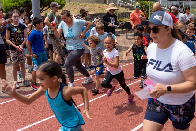 Runners take off for a lap around Kelly Field near the starting line of the Lil Murph Challenge at Camp Walker, Republic of Korea, June 4, 2022. The Lil Murph Challenge is a U.S. Army Garrison Daegu fitness event for children (ages 5-11) held to...