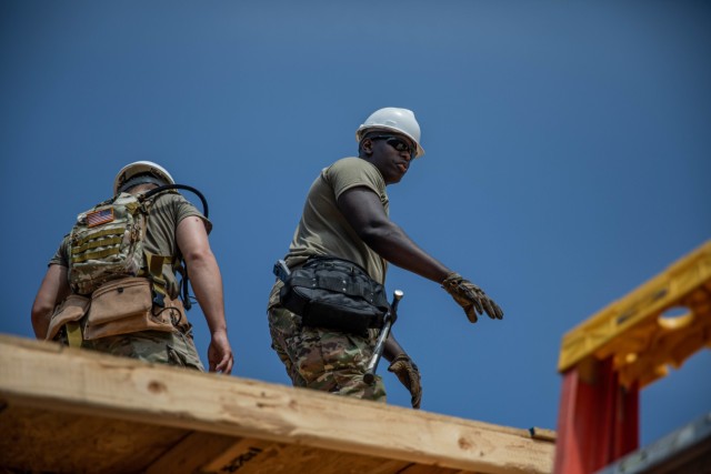 Spc. David Kalama, 2120th Engineer Company, 120th Engineer Battalion, 90th Troop Command, Oklahoma Army National Guard, works on a roof as a part of an Innovative Readiness Training mission while building homes for the Cherokee Veterans Housing Initiative in Tahlequah, Oklahoma, June 6, 2022. They are able to directly help Oklahomans thanks in part to the IRT – a Department of Defense initiative that is a joint environment with National Guard Soldiers and Airmen. 