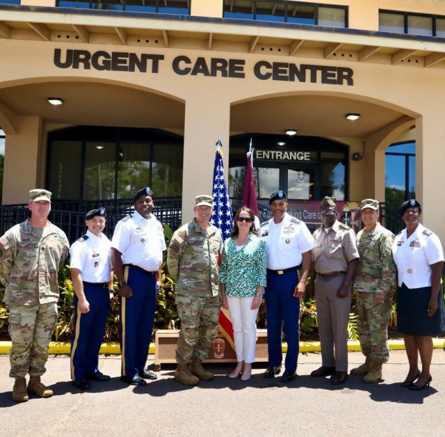 Command Sgt. Maj. Robert Haynie, Command Sergeant Major, 25th Infantry Division; Maj. Keith Barry Garcia, Officer in Charge, Urgent Care Center, Desmond T. Doss Health Clinic; Col. Randall Freeman, Deputy Commander for Clinical Services, Desmond T. Doss Health Clinic; Maj. Gen. Joseph Ryan, Commanding General, 25th Infantry Division; Ms. Lou Ellen Horwitz, Chief Executive Officer, Urgent Care Association; Col. Anthony King, Commander, Desmond T. Doss Health Clinic; Chaplain Capt. Opeyemi Olu-Wafisoye; Col. Bill Soliz, Commander, Tripler Army Medical Center; Sgt. Maj. Audrey David, Sergeant Major, Desmond T. Doss Health Clinic; celebrate the opening of the newly re-designated Urgent Care Center. This Urgent Care Center is the only facility accredited by the Urgent Care Association within the Department of Defense. 
