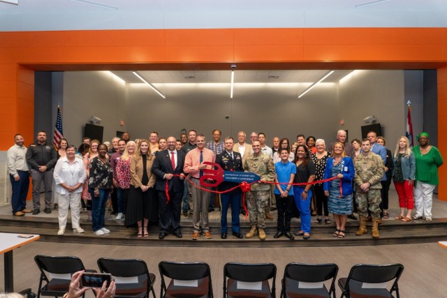 Fort Leonard Wood senior leaders came together with members of the local community and Col. Patrick Hogeboom, military liaison from the Office of Local Defense Community Cooperation (center), to dedicate the remodeled Parker Educational Center,...
