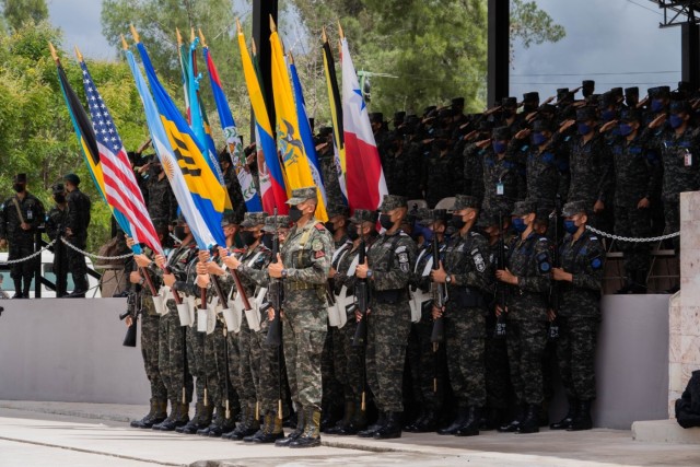 Multinational colors are presented at the opening ceremonies of Fuerzas Comando 2022 (FC22). FC22 is a Foreign Military Interaction exercise designed to enhance multinational and regional cooperation, mutual trust and confidence, and to improve the training, readiness, interoperability, and capability of regional Special Operations Forces.
