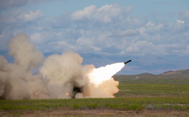 A High Mobility Artillery Rocket System engages its target during a qualification event at Western Strike 22 at Orchard Combat Training Center, Idaho, June 6, 2022. The eXportable Combat Training Capabilities exercise led by the 65th Field Artillery Brigade provides National Guard Soldiers immersed training similar to a combat training center to increase readiness and lethality. (U.S. Army National Guard photo by Sgt. Alejandro Lucero)