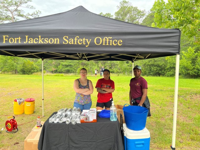Three volunteers from Moncrief Army Health Clinic stepped in to give out safety promotions: 
From left to right, Mary Pennington (Nutritionist), Noemi Dolores (Troop Medical Clinic), rendered first aid to an injured child, and Charlyn Randle (Pharmacy), gave out cooling cloths. 
