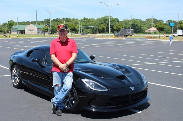 Retired Chief Warrant Officer 4 James Bussey, an acquisition manager for the Space and Missile Defense Command, brought his 2013 Dodge Viper to compete in the Cruise-In Car Show.