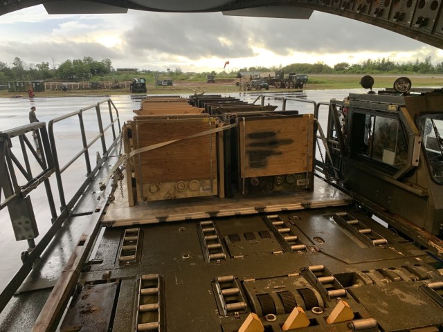 Patriot PAC-2 Interceptor Missiles are unloaded from an Air Force C-17 Globlemaster III Aircraft