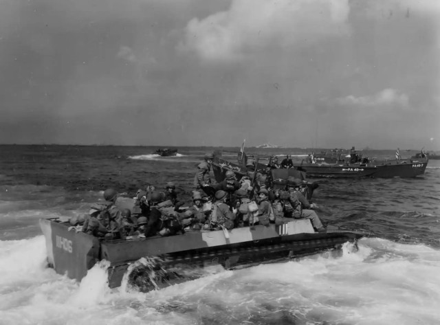 7th Infantry Division troops moving to land on Okinawa in an LVT Amtrac. 
