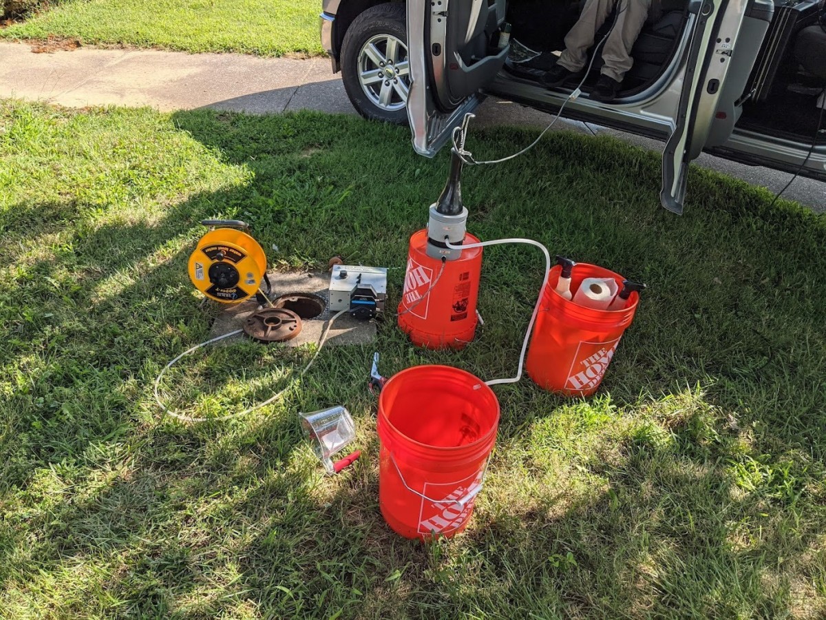 Environmental engineers monitor water quality through groundwater