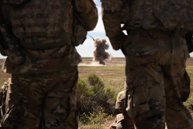 Combat engineers with the Iowa National Guard’s 833rd Engineer Company out of Ottumwa, Iowa, watch an explosion from a safe distance on a demolition range at Orchard Combat Training Center near Boise, Idaho, June 10, 2022. The Soldiers traveled to Idaho for an exportable combat training capabilities exercise, or XCTC, called Western Strike, to increase the unit’s combat readiness and lethality. (U.S. Army National Guard photo by Sgt. 1st Class Christie R. Smith)