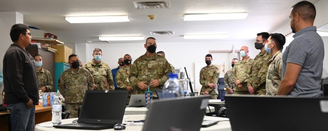 Brig. Gen. Jamison Herrera, deputy adjutant general, New Mexico National Guard, talks to the Cyber Innovative Readiness Training team during his visit to Mescalero Apache Telecom Inc. in Ruidoso, N.M., June 16, 2022. The New Mexico Air and Army Guard spent a week with their MATI counterparts focusing on cyber issues.
(Staff Sgt. Ryan Sanders)