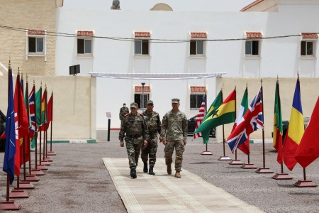 U.S. Army Maj. Gen. Andrew M. Rohling, commander, U.S. Army Southern European Task Force, Africa, and Royal Armed Forces Lt. Gen. Belkhir El-Farouk enter the combined arms rehearsal sandbox at Agadir, Morocco, June 20, 2022 during African Lion 22. African Lion 22 is U.S. Africa Command&#39;s largest, premier, joint, annual exercise hosted by Morocco, Ghana, Senegal and Tunisia, June 6 - 30. More than 7,500 participants from 28 nations and NATO train together with a focus on enhancing readiness for U.S. and partner nation forces. AL22 is a joint all-domain, multi-component, and multinational exercise, employing a full array of mission capabilities with the goal to strengthen interoperability among participants and set the theater for strategic access.