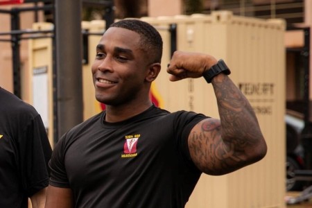 A Soldier from 325th Brigade Support Battalion, 3rd Infantry Brigade Combat Team, 25th Infantry Division poses after executing physical readiness training on Schofield Barracks, Oahu, Hawaii, May 18, 2022.