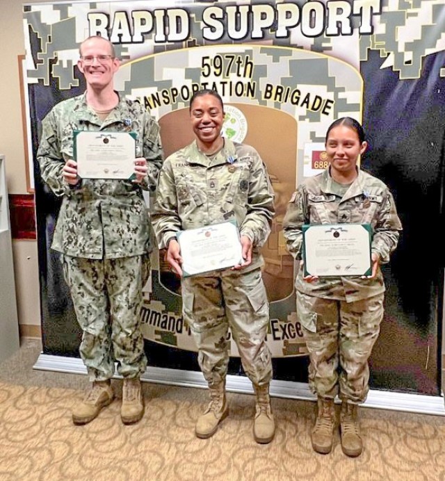 
U.S. Navy Lt. Robert (Tristan) White, Operations Officer and Acting Chief of Operations, Sgt. First Class Terri Francois, Brigade NCOIC/Training Readiness and Sgt. Yoana Garciarubio, S3 Training Readiness NCO, were awarded the Army Achievement Medal at Joint Base Langley-Eustis, Va. June 24.
