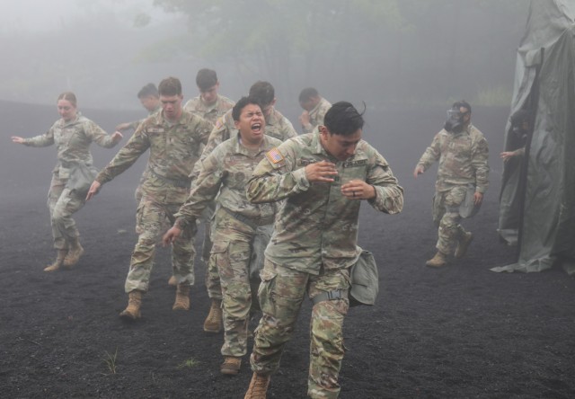 Soldiers assigned to the 35th Combat Sustainment Support Battalion exit a gas chamber during a training event at the Combined Arms Training Center Camp Fuji, Japan, June 23, 2022. More than 60 Soldiers participated in the training, as part of a larger effort to increase readiness in the battalion.
