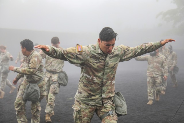 Capt. Jacob Melendez and other Soldiers assigned to the 35th Combat Sustainment Support Battalion exit a gas chamber during a training event at the Combined Arms Training Center Camp Fuji, Japan, June 23, 2022. More than 60 Soldiers participated in the training, as part of a larger effort to increase readiness in the battalion.