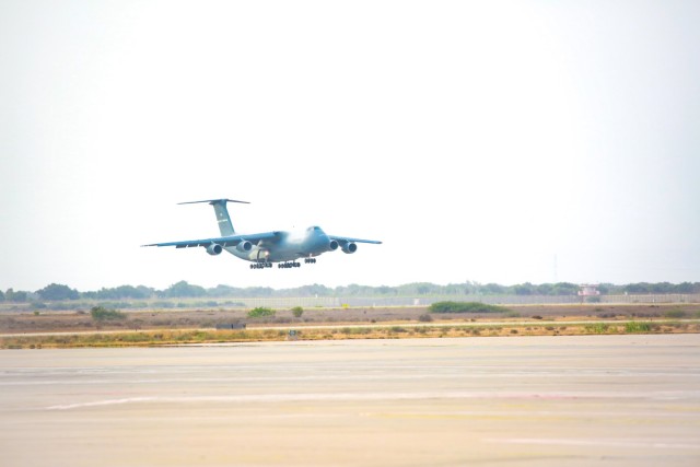 U.S. Air Force C-5 Galaxy loaded with U.S. Soldiers from the 1-211th Aviation Regiment, Utah Army National Guard, lands on June 20, 2022, at Agadir Al-Massira International Airport, Morocco. AL22 is U.S. Africa Command's largest, premier, joint, combined annual exercise hosted by Morocco, Ghana, Senegal, and Tunisia, June 6 - 30. More than 7,500 participants from 28 nations and NATO train together with a focus on enhancing readiness for U.S. and partner-nation forces. AL22 is a joint all-domain, multi-component, and multinational exercise, employing a full array of mission capabilities with the goal to strengthen interoperability among participants and set the theater for strategic access. (U.S. Army National Guard photo by Spc. Christopher Hall)