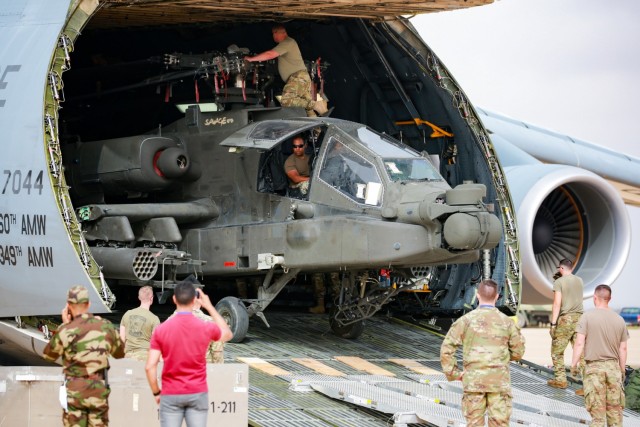 U.S. Soldiers from the 1-211th Aviation Regiment, Utah Army National Guard, unload an AH-64 Apache helicopter on June 20, 2022, at Agadir Al-Massira International Airport, Morocco. AL22 is U.S. Africa Command's largest, premier, joint, combined...