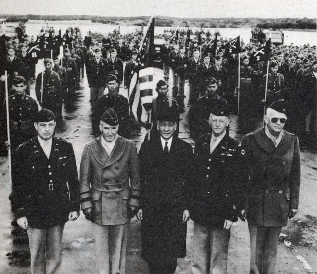 Sergio Osmena, vice president of the Philippine Commonwealth (foreground center), reviews the U.S. Army’s Filipino regiments at Fort Ord in December 1942. Col. Robert H. Offley (foreground far left), was chosen to lead the regiments being fluent in Tagalog, a main Filipino language.