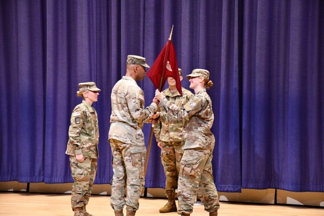 Outgoing Andrew Rader U.S. Army Health Clinic commander Lt. Col. Jessica Milloy relinquishes command to Col. Tracy Michael, commander of the Fort George G. Meade Medical Department Activity, June 16.  