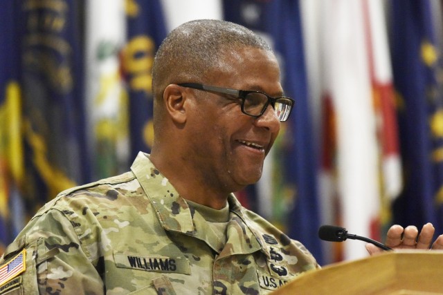 Outgoing U.S. Army Chemical, Biological, Radiological and Nuclear School Regimental Command Sgt. Maj. Christopher Williams speaks during the change-of-responsibility ceremony Friday in Lincoln Hall Auditorium. Williams is retiring after 33 years...