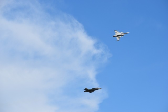 Two JAS 39s fly above Chievres