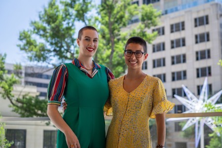Alex Vermooten (they/them), left, and Leah Lucio (she/her), right, serve as management analysts with the Commander’s Action Group at Army Futures Command headquarters in Austin, Texas. 