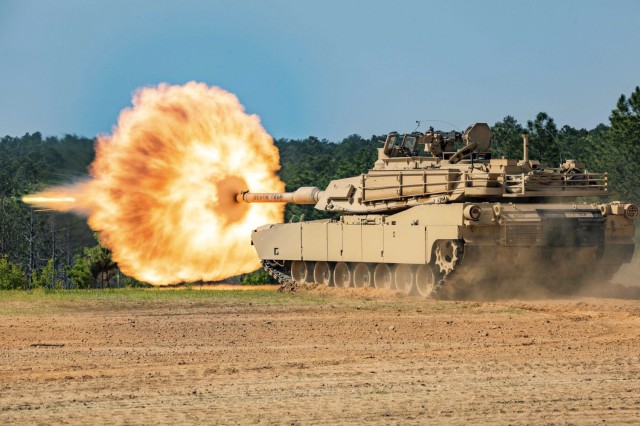 An M1A2 Abrams fires during the Sullivan Cup at the Army Armor School at Fort Benning, Ga., April 29, 2022. The biennial competition evaluates the performance of the best tank crews from across the Armor Branch, the Marine Corps and international partner militaries.