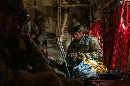 
A U.S. Army Soldier assigned to the 19th Special Forces Group (Airborne), Utah Army National Guard, counts the number of static lines after his jumpers, known as a stick, successfully jumped out of a Moroccan C-130 in Grier Labouihi, Morocco, during African Lion 22, June 19, 2022. African Lion 22 is U.S. Africa Command's largest, premier, joint, combined annual exercise hosted by Morocco, Ghana, Senegal, and Tunisia, June 6 - 30. More than 7,500 participants from 28 nations and NATO train together with a focus on enhancing readiness for U.S. and partner-nation forces. AL22 is a joint all-domain, multi-component, and multinational exercise, employing a full array of mission capabilities with the goal to strengthen interoperability among participants and set the theater for strategic access. (U.S. Army National Guard photo by Spc. Mackenzie Willden)
