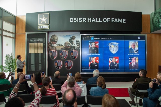 The C5ISR Hall of Fame Class of 2022 display is unveiled in front of the inductees, their families and their guests in the lobby of building 6002 June 22. The current class’s pictures and biographies will be on display for one year.